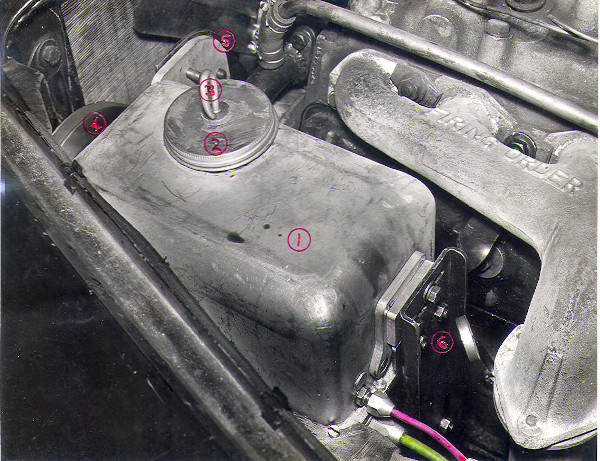 hydraulic pump inside car engine compartment