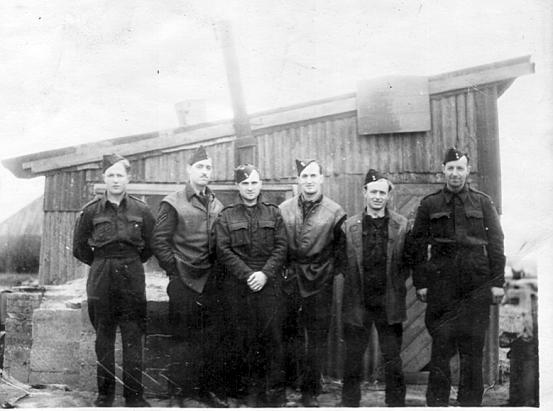 RAF groundcrew in front of dispersal hut