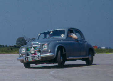 blue car cornering sharply